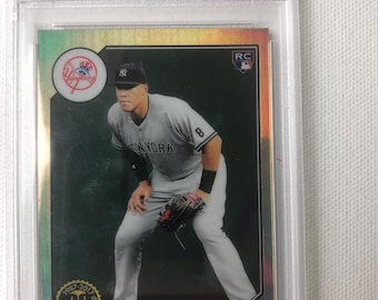 2017 Topps Chrome Aaron Judge 1987 style Refractor Rookie Card graded by PSA 9/10 Mint (corners gem mint but slightly off center -“OC”)