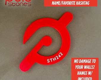 May include: A bright red, circular, stylised logo cutout featuring the text STH242. The design includes a curved arm extending from the centre and a diagonal line segment. The logo is presented with text overlays regarding customisation and wall hanging.