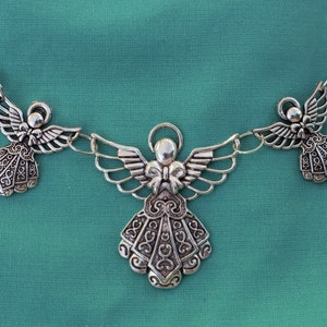 Cape à épingles kilt avec fermeture châle 3 anges