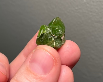 64 CRT Beautiful peridot Rough crystal combined lovely with self standing position from kpk Pakistan