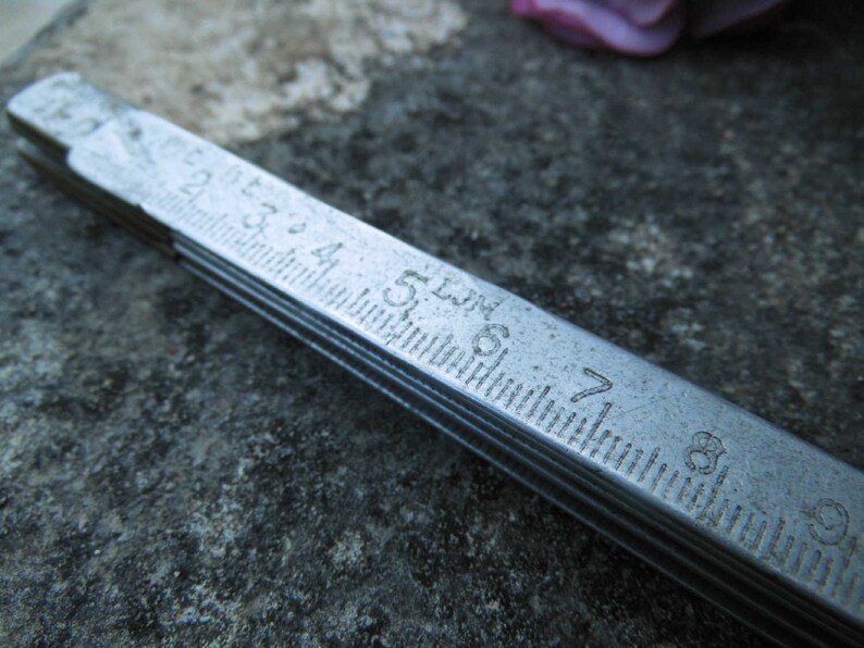 Vintage French 1950s Duralumin 1 Metre Folding Ruler in Centimetres with brass hinges carpenters artisan old fashioned design and quailty