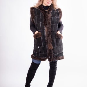 Sheepskin vest. Very warm.