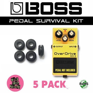 May include: A 5-pack of black rubber pedalboard grommets for use with Boss pedals. The image also shows a yellow Boss Overdrive OD-3 pedal, but the pedal is not included in the pack.