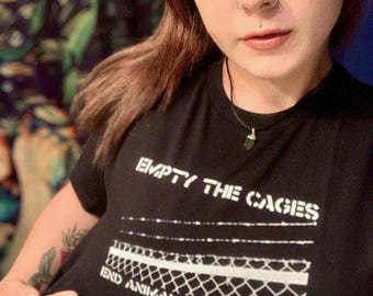 Leere die Käfige, Ende der Tierausbeutung Vegan Tierrechte Aktivismus Demonstration T-Shirt Schwarz Unisex Herren Damen
