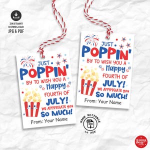 May include: Two rectangular white gift tags with red and blue text reading JUST POPPIN' BY TO WISH YOU A HAPPY FOURTH OF JULY! WE APPRECIATE YOU SO MUCH! FROM: YOUR NAME. Each tag features a red and white striped popcorn bucket graphic and red twine.