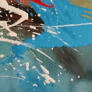 May include: Abstract painting with splashes of white, blue, and red paint on a textured canvas.