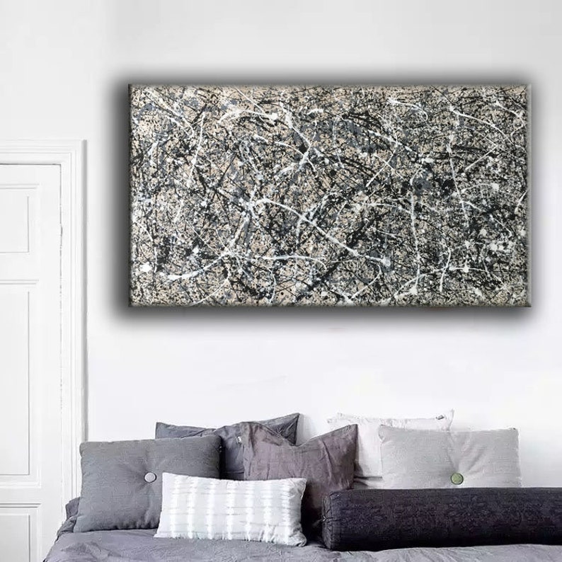 May include: Abstract painting with black, white and grey paint splatters and lines on a canvas.