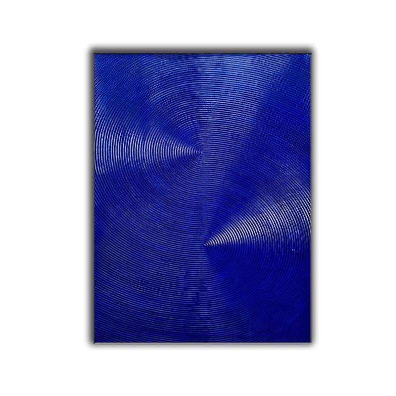 May include: Abstract painting with a blue background and concentric circles in a textured, raised pattern.