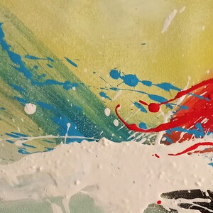 May include: Abstract painting with splashes of blue, red, white, and green paint on a yellow background.