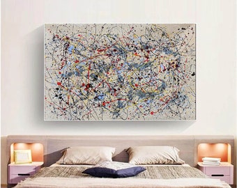 May include: Abstract expressionist painting with a beige background and a chaotic arrangement of colorful paint splatters. The artwork features black, red, yellow, blue, and gray paint, creating a dynamic and energetic composition. The painting is rectangular and framed.
