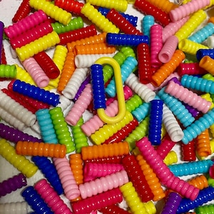 May include: A set of three ceramic mugs with a speckled, matte finish. The mugs are in shades of cream, light gray, and dark gray. Each mug has a simple, minimalist design, perfect for coffee or tea.