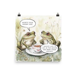 May include: Two green frogs sitting on a rock with a cup of tea. One frog is asking the other what their dream job is. The other frog replies that they would like to live in the woods, far away from society.