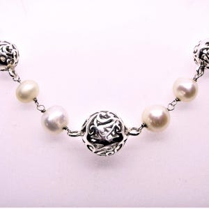 Sterlingzilver en echte witte parels slabbetje vintage