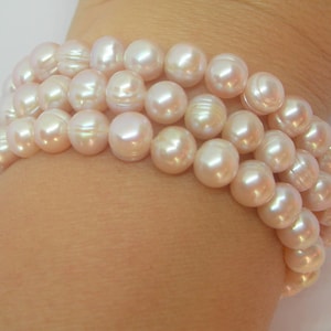 Genuine FRESHWATER PEARLS BRACELETS  Peach coloured Set of three