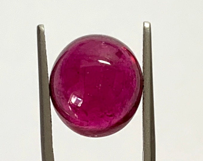 Natural tourmaline, cabochon  oval mm. 14,79x13,37, h. mm.7,75, cts.11,91.