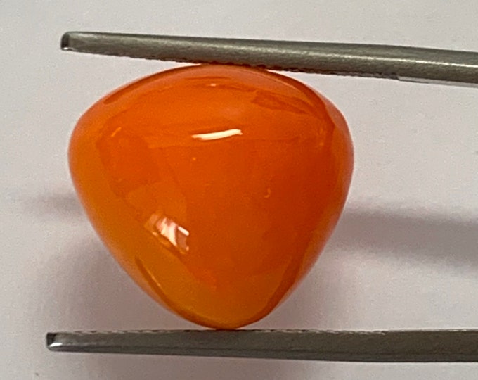 Natural orange opal, irregular trillion mm.14,97x14,38, h.mm.8,50, cts.9,18