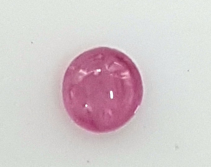 Natural pink sapphire, oval cabochon cut, mm.5,80x5,50, h. mm.2,90, weight cts.0,92