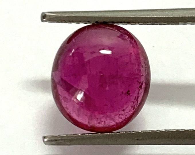 Natural tourmaline, cabochon oval mm. 11,72x10,69, h. mm.5,47, cts.5,15.