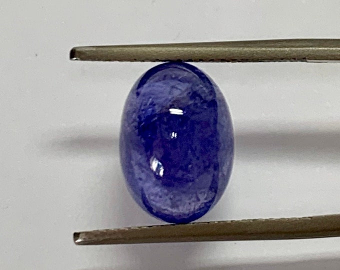 Natural Tanzanite, cabochon oval 12,70x9,10 mm, h.mm.7,25, cts.7,41