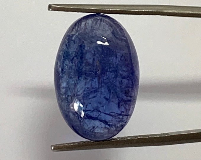 Natural Tanzanite, cabochon oval 19,83x13,44 mm., h.mm.7,38, cts.18,15