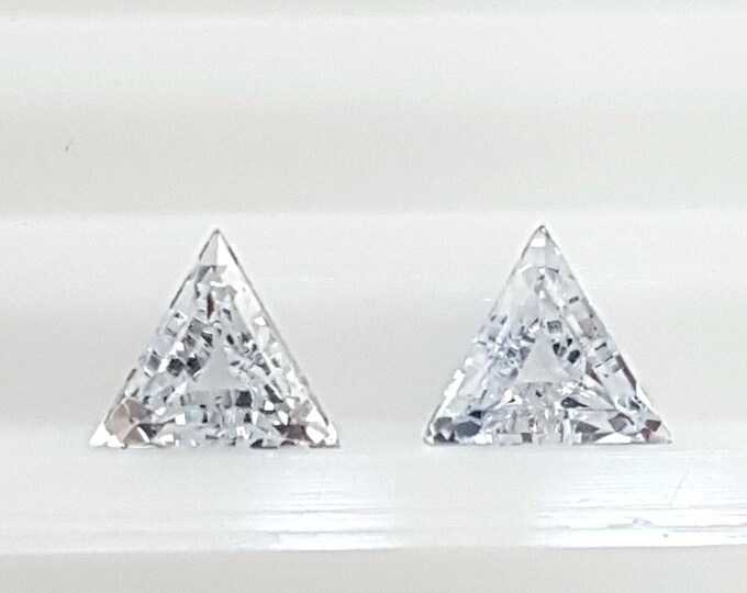 Couple of natural white sapphire, faceted triangle/trillion mm.4,43x4,34x4,43 h. mm 2,50