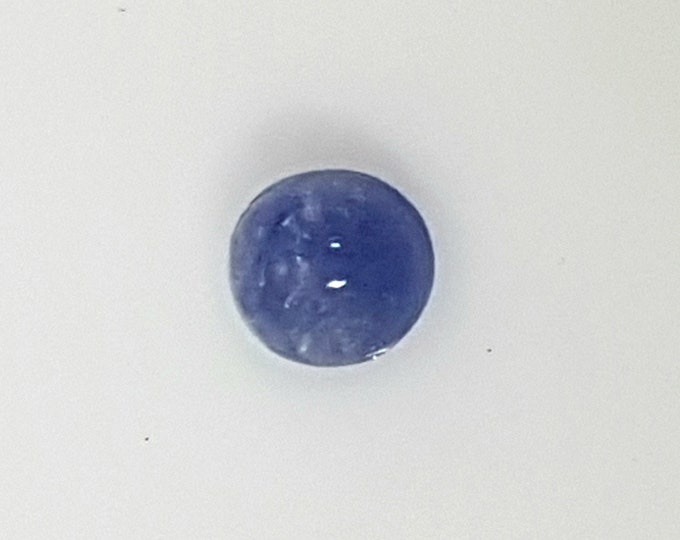 Natural blue sapphire, oval cabochon cut, mm.5,50x5,27, h.mm.3,56, weight cts.0,99