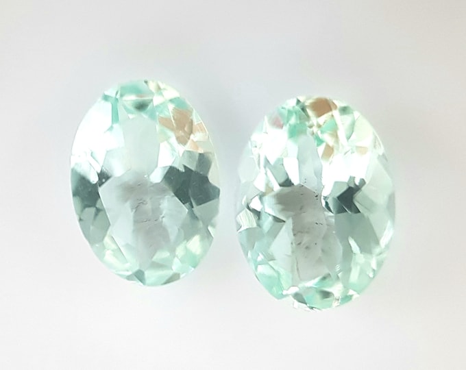 Natural Aquamarine, ct.1,20, Oval faceted couple 7,00x5,00 mm.