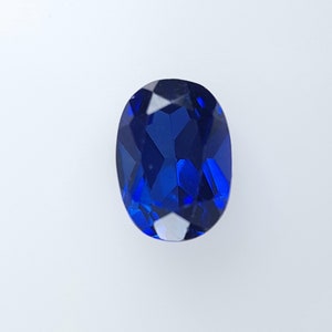 Lab grown royal blue Sapphire Oval 7x5mm. average weight ct.1,18