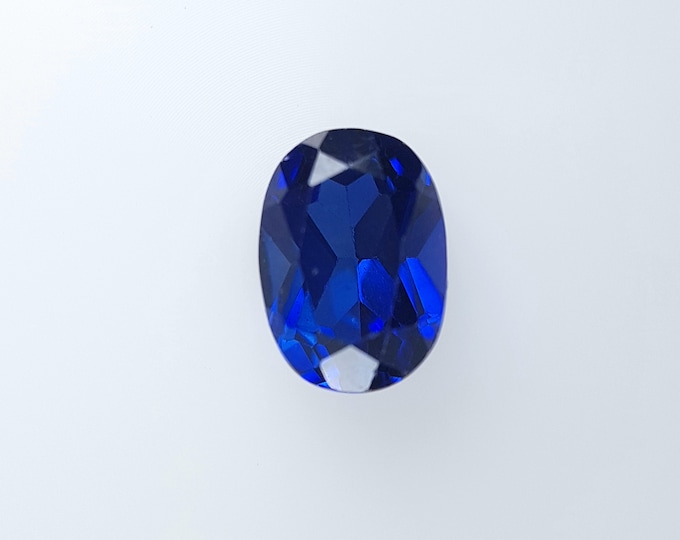 Lab grown royal blue Sapphire Oval 7x5mm. average weight ct.1,18