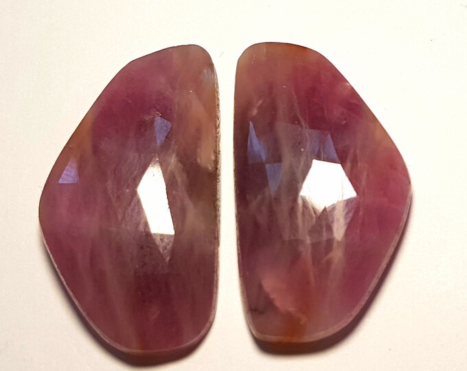 Natural red Sapphire, ct.59,20, flat rosecut couple, irregular cut, 32x18 mm.