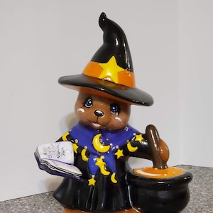 Bear Witch(a), Mrs. is here in time for Halloween! What a GREAT ceramic piece to add to your decor.  Price includes shipping.