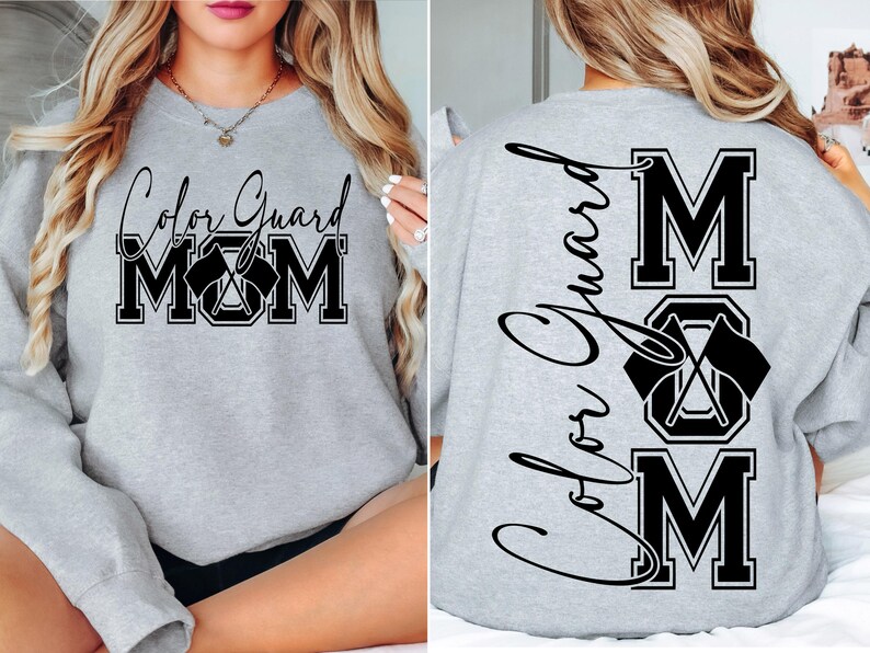May include: Gray sweatshirt with the text "Color Guard Mom" on the front and "Color Guard Mom" with a crossed flag design on the back.