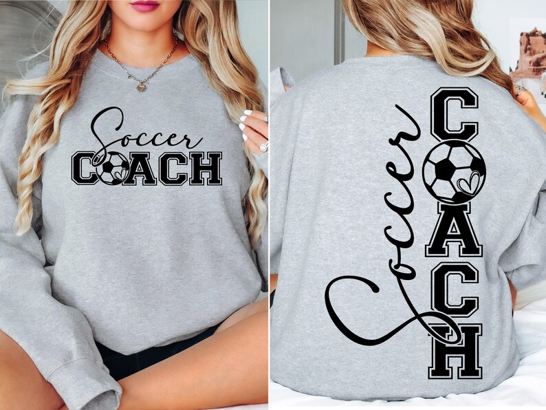May include: Grey sweatshirt with the text "Soccer Coach" on the front and the text "Soccer Coach" vertically down the back with a football graphic.