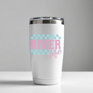 May include: White stainless steel tumbler with a pink and blue checkered design and the text "River life".