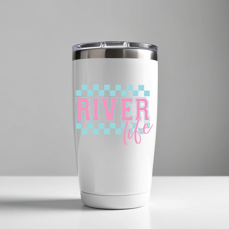 May include: White stainless steel tumbler with a pink and blue checkered design and the text "River life".