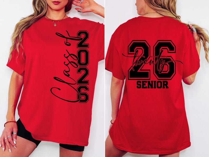 May include: Red t-shirt with black text. The front of the shirt says "Class of 2026" vertically. The back of the shirt says "26 Twenty Senior". The shirt is a graduation-themed item.