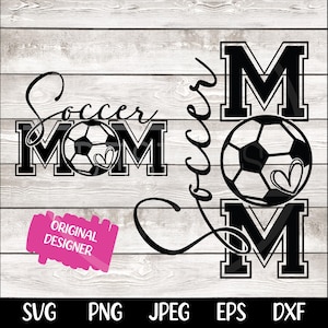 May include: Black and white graphic design of the word "Soccer Mom" with a soccer ball in the middle of the word "Mom". The word "Soccer" is written in a cursive font. The design is on a white wood background.