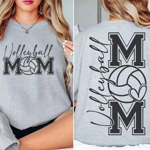 May include: Gray sweatshirt with the text "Volleyball Mom" and a volleyball graphic on the front. The back of the sweatshirt has the text "Volleyball Mom" with a volleyball graphic.