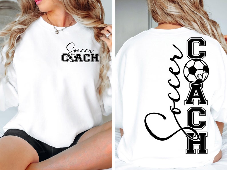 May include: White sweatshirt with black text that says "Soccer Coach" on the front and "Soccer COACH" vertically on the back with a football and heart graphic.
