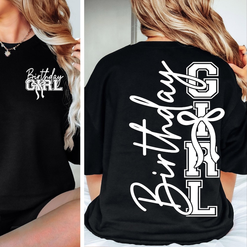 May include: Black t-shirt featuring the text "Birthday Girl" in white script and block letters. The front of the shirt displays "Birthday Girl" with a bow. The back has "Birthday Girl" written vertically.