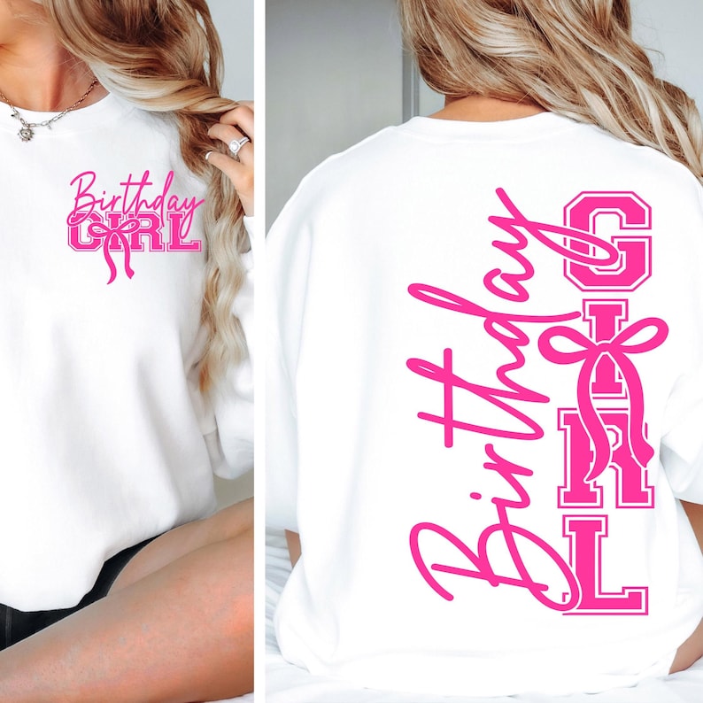 May include: White sweatshirt with the text "Birthday Girl" in pink script and block letters. The front features the text with a bow graphic. The back of the sweatshirt has the words "Birthday Girl" vertically with a bow graphic.