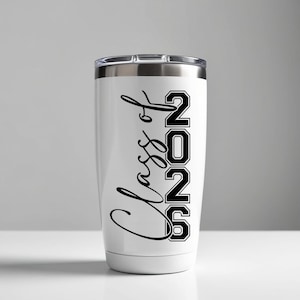 May include: White insulated tumbler with a silver lid. The tumbler features the words "Class of 2026" in black script and block letters. The tumbler is designed to keep beverages hot or cold.