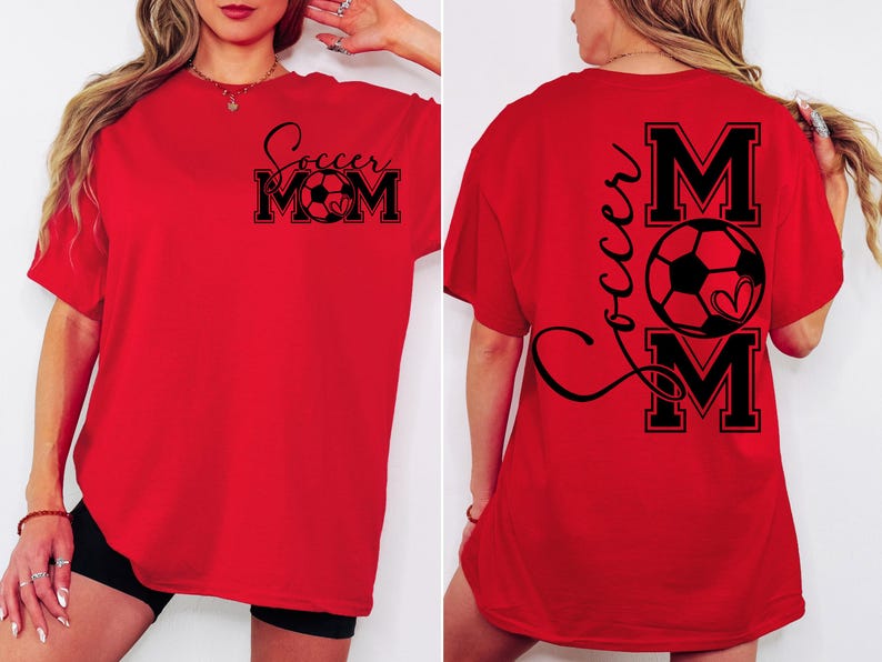 May include: Red short-sleeved t-shirt with black text that says "Soccer Mom" and a soccer ball graphic on the front. The back of the shirt has the text "Soccer Mom" with a soccer ball graphic and a heart.