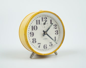 Reloj despertador mid Century (años 60) fabricado por Lumen P, Alemania