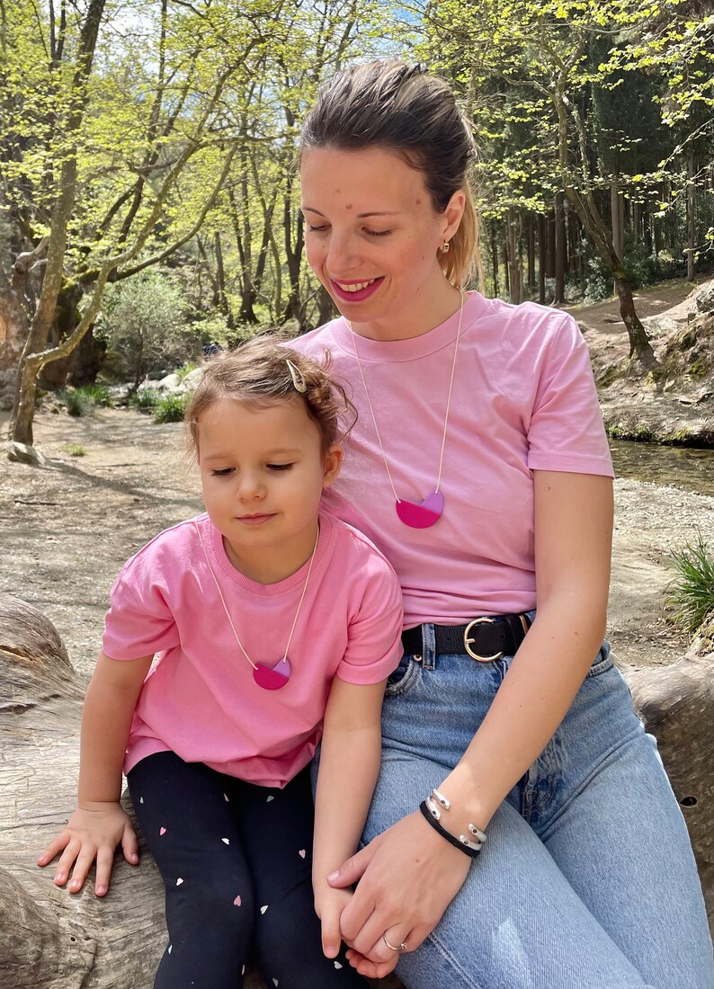 Mother and Daughter wearing Violet and Lilac Polymer Clay Necklaces