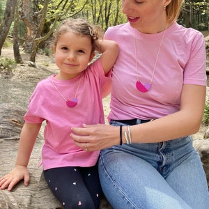 Mother and Daughter wearing Violet and Lilac Polymer Clay Necklaces