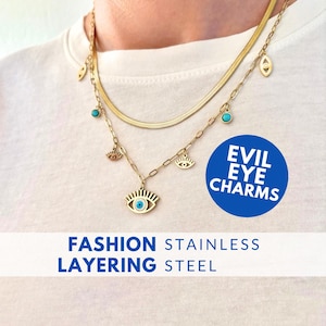 Halsband i rostfritt stål med guldfärgat ondt öga, lager på lager, blå berlock, ögonmotiv, trendigt smyckesset, present till moderedaktör, konstnärlig signaturlook
