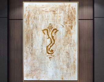 May include: A white canvas painting with a gold Ganesha symbol in the center. The background is textured and has a subtle beige hue.