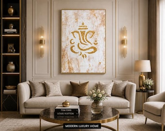 May include: A living room scene featuring a large abstract painting with a gold Ganesh design. The room includes a beige sofa with decorative pillows, a round coffee table, and a side table with a lamp. The text "MODERN LUXURY HOME" is visible.