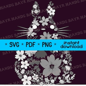 Puede incluir: Un diseño floral gris y blanco en forma de cara de gato. El fondo es de color morado oscuro.